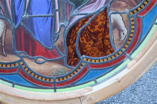 A circular stained glass window W.91cm